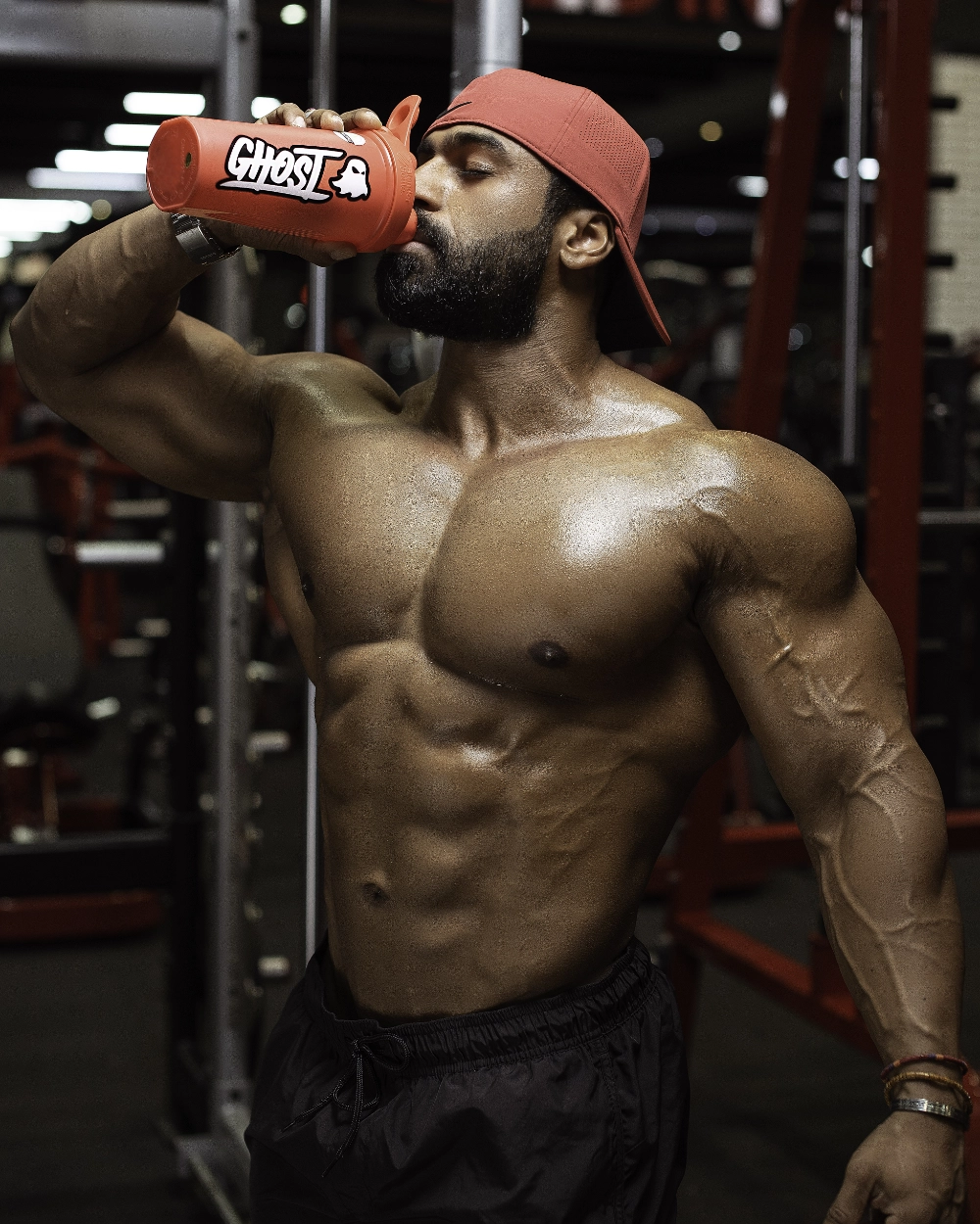 Dubai Athlete in Binous Gym drinking supplement