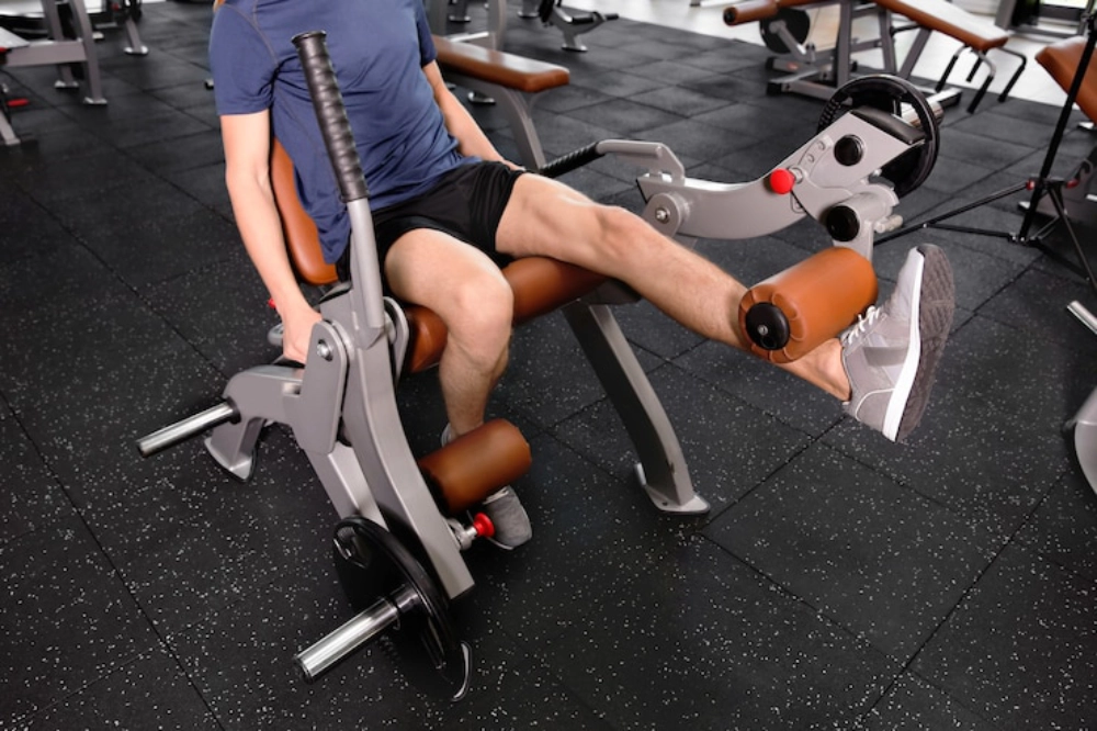 Athletes performing eccentric leg extensions in a Stirling University