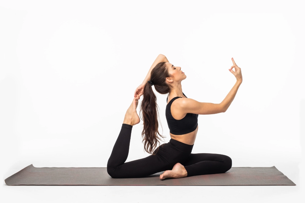 A sporty young woman doing yoga