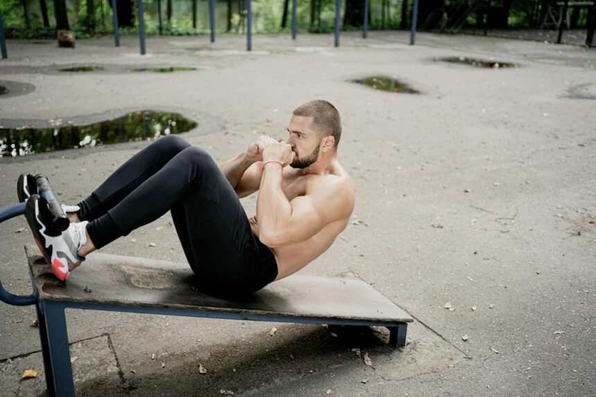 Athlete doing Abdominal crunches on a decline bench