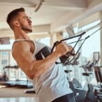 Close grip high row exercise on a TRX
