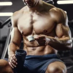 Fit Man mixing BCAA in the gym for maximum protein synthesis
