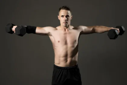 Shoulder Workout - A man Doing Dumbell Lateral Raises