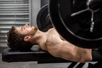 An athlete doing Reverse grip bench press exercise