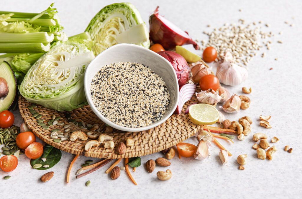 Assortment of science-backed soluble fiber foods like oats, apples, chia seeds, lentils, and avocado for improved gut microbiome and weight management.